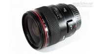 Làm sao để làm sạch ống kính máy Canon