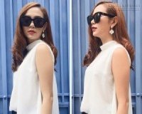 Minh Hằng trông thật xinh đẹp, rạng rỡ và thanh lịch với áo sơ mi cách điệu đầy ấn tượng.