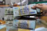 Ngân hàng tăng mượn tiền đồng, giảm USD