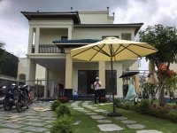 Nên chọn dù che nắng cho quán cafe như thế nào?