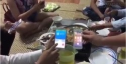 Clip: Thách nhau thả 2 chiếc điện thoại vào ca trà đá để thử độ phủ sóng