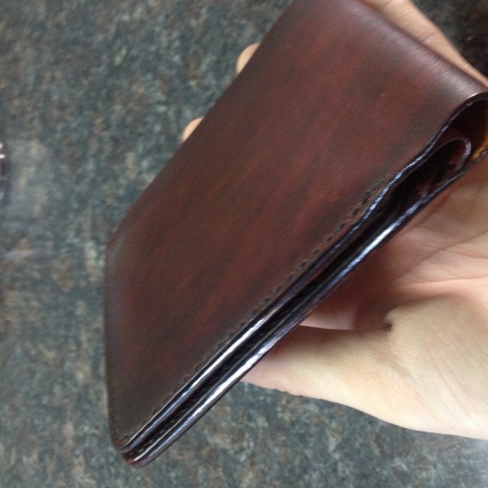  Cách nhận biết ví da bò thật giả(1)