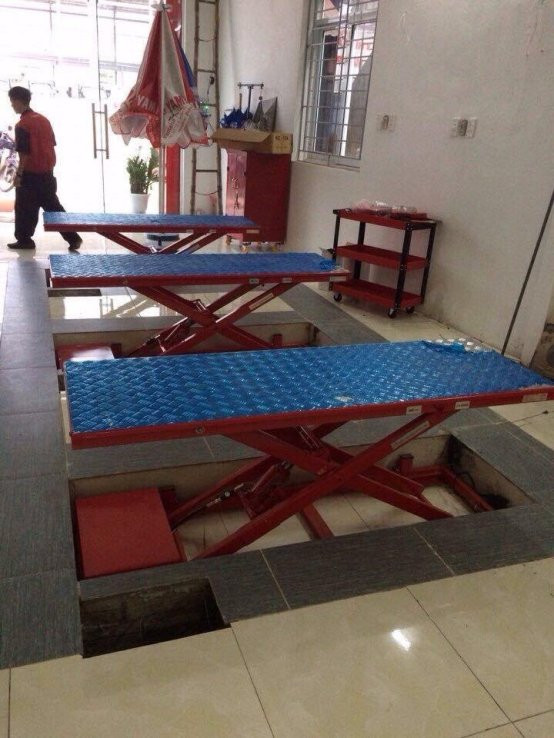 Bàn nâng xe máy âm nền TT03