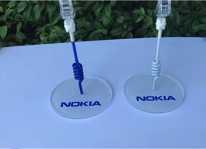 Wobbler để bàn để mica in logo chân để Nokia